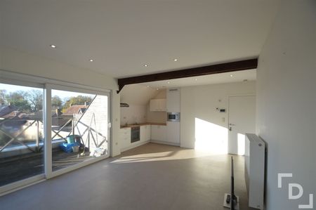 Recent appartement met zicht op het dorpsplein - Photo 4