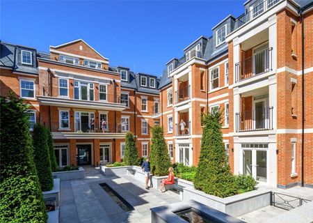 Situated in an impressive building, this exceptionally stylish apartment has been finished to a very high specification throughout. - Photo 2