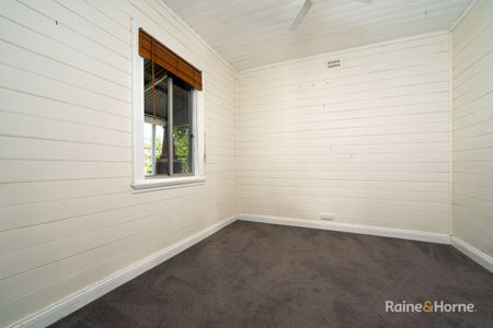 Well-Appointed Home with a Large Flat Backyard in a Central Location - Photo 2