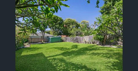 Walk to the beach from this beauty - Photo 4