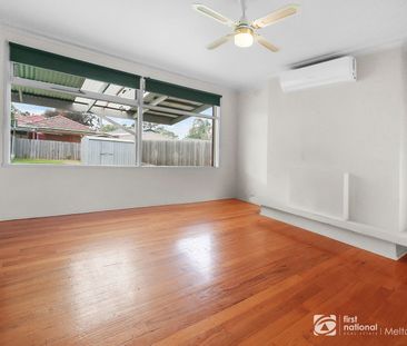 Charming Three-Bedroom Home - Photo 2