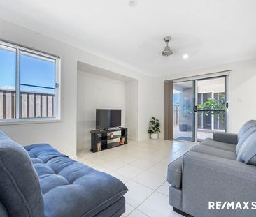 Modern Coastal Living with Solar Savings in Bucasia - Photo 1