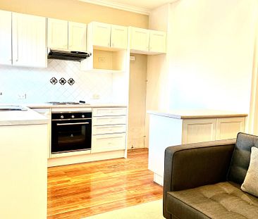 Light filled top floor two bedroom furnished unit - Call or email to book in a viewing - Photo 4