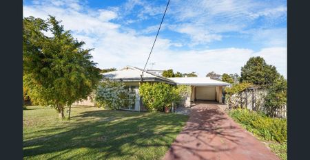 OPPORTUNITY AWAITS AT THIS CHARATERISTIC HOME IN HILLARYS! - Photo 4