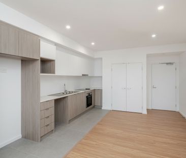 BRAND NEW APARTMENT IN BRAND NEW COMPLEX - Photo 2