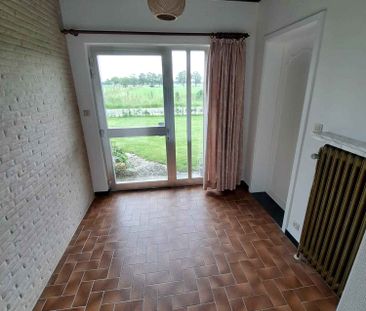 Een gunstig gelegen en gerenoveerde laagbouwwoning met tuin en inpa... - Photo 4