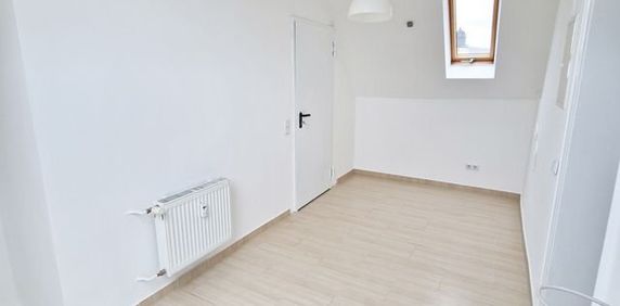 Gemütliches Apartment mit Wohnküche in zentraler Lage - Photo 2