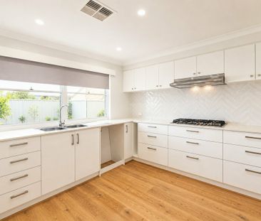 Spacious Family Living in a Prime Harrisdale Location - Photo 6
