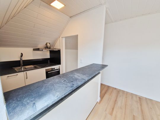 Charmant appartement mansardé de 2,5 pièces - Photo 1