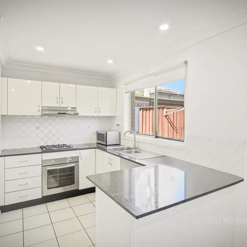 “Spacious Home with low maintenance backyard” - Photo 1
