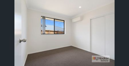 Neat & Modern 2-Bedroom Unit - Photo 2