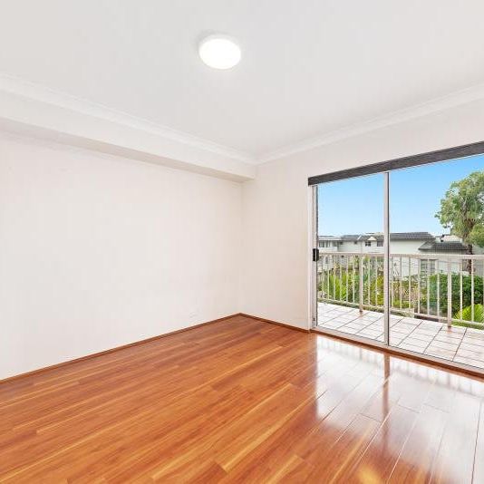 OVERSIZED THREE BEDROOM WITH PARKING! - Photo 1