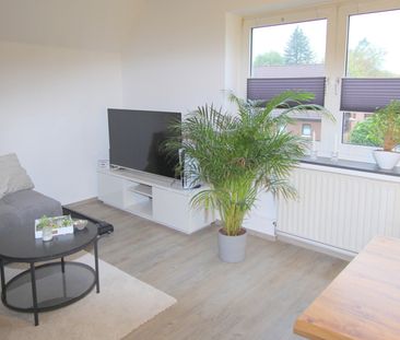 Attraktive 3-Zimmer-Obergeschosswohnung in einem Zweifamilienhaus a... - Foto 1