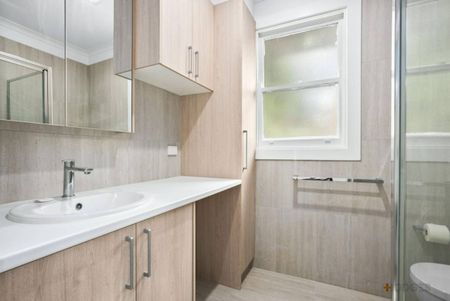 Freshly Renovated Coastal Retreat – Walk to the Beach! - Photo 3