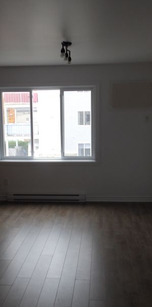 Logement 4 1/2 1 E étage Style Condo - Photo 1