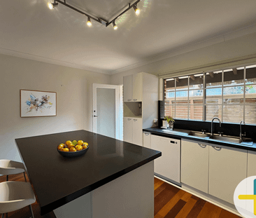 House-Like Townhouse Living with Ultimate Privacy & Convenience - Photo 2