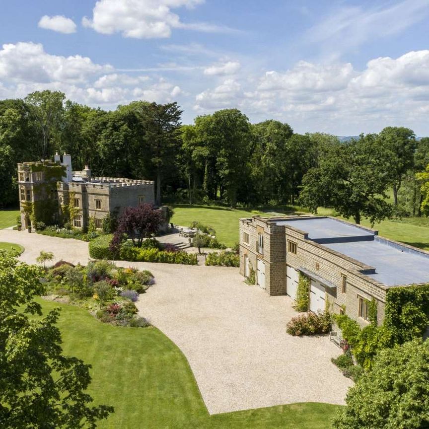 Beautifully refurbished family home of the highest quality, in an idyllic rural setting with far reaching views extensive secondary accommodation and about 14 acres. - Photo 1