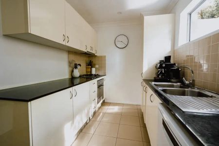 “Spacious villa-like home in quiet block” - Photo 2