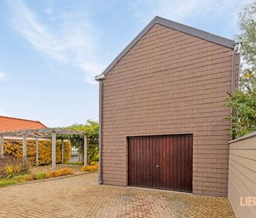 Instapklare gezinswoning met 3 SLKS, garage en tuin op toplocatie! - Foto 3