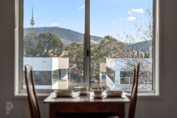 Top-Floor Living Between the City and Braddon - Photo 1