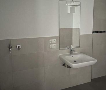 Wohlfühlwohnung mit Balkon und moderner Ausstattung im Erstbezug! R... - Foto 5