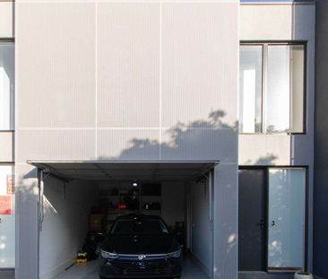 Architectural Townhouse In Brunswick Awaits - Photo 6