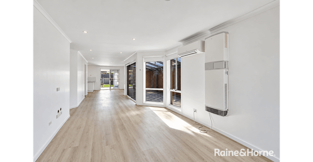 Spacious Family Living in the Heart of Roxburgh Park - Photo 1