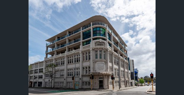 Boutique City Living with Historic Charm & Modern Luxury - Photo 1