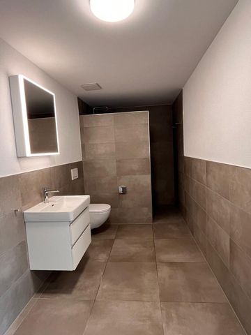 Newly renovated 2.5-room apartments in a central location in Lyss - Photo 5