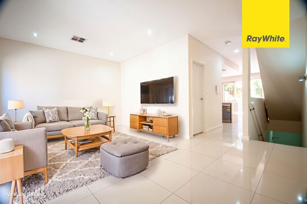 CONTEMPORARY THREE BEDROOM TOWNHOUSE IN MOST SOUGHT AFTER LOCATION - Photo 1