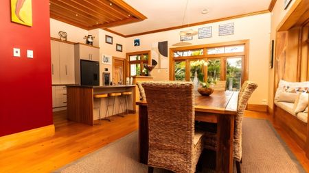 Exquisite 4-Bedroom Manor with Stunning Bush Views in Lucas Heights - Photo 3