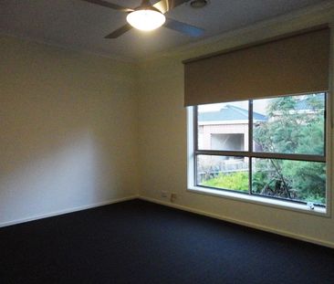 Positioned in a quiet and convenient pocket of Meadow Heights, this... - Photo 2