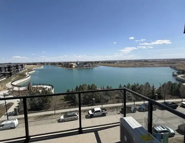 TOP FLOOR BRAND NEW EXECUTIVE CONDO WITH UNOBSTRUCTED VIEW OF MAHOGANY LAKE | 1802 Mahogany Boulevard Southeast, Calgary - Photo 1