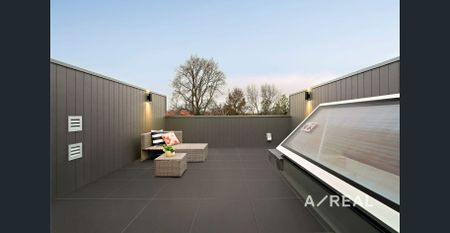 Experience Contemporary Luxury and Elegance in a Near-New Three-Bedroom Residence! - Photo 5