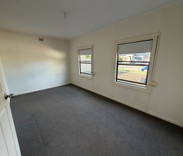 Three Bedroom Home with Large Yard! - Photo 1