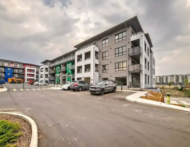 PET FRIENDLY CORNER UNIT CONDO - MAIN FLOOR | 350 Livingston Common Northeast, Calgary - Photo 1