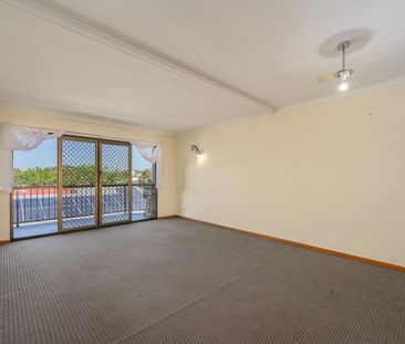 CENTRALLY LOCATED TWO LEVEL APARTMENT - Photo 1