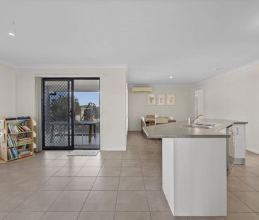 Spacious 4-Bedroom, 2-Living Gem with Solar - Photo 1