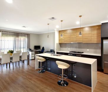 Stunning Three Bedroom Home in Great Location! - Photo 1