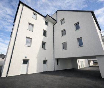 Neubau: Stilvolle Wohnung in bester Lage mit Küche - Photo 2