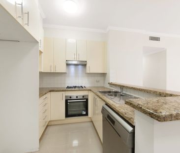 Freshly Renovated Two-Bedroom Apartment with Resort-Style Facilities - Photo 4