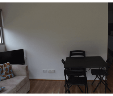 Secure 2-Bedroom Apartment with Cafes, Shops & Transport at Your Do... - Photo 1