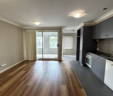 Modern Inner-City Living with Pool & Gym Access - Photo 3