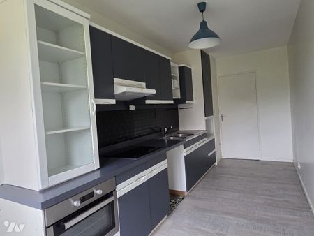 Un appartement 3 chambres proche du centre ville avec emplacement voiture. - Photo 3