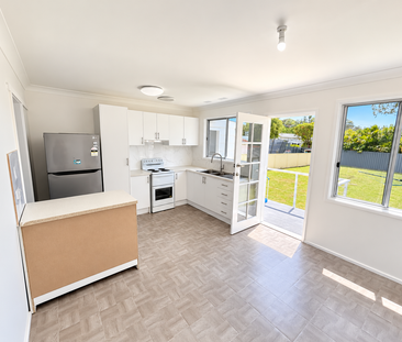 FRESHLY RENOVATED THREE BEDROOM HOME - Photo 4