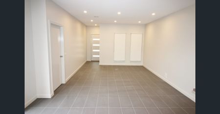 MODERN TWO BEDROOM UNIT WITH DOUBLE GARAGE - Photo 2