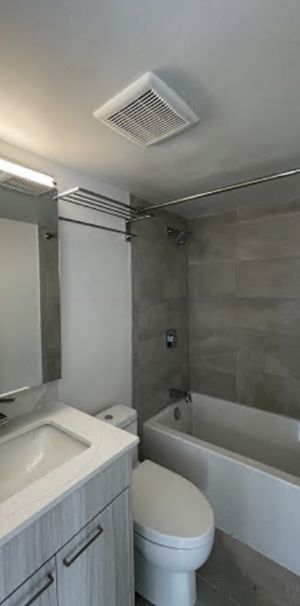 SKYLINE APARTMENTS - Photo 1