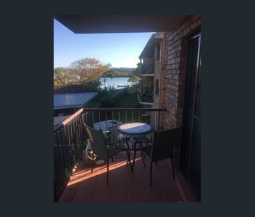 Bright 3-Bedroom Unit with River Views - Photo 3