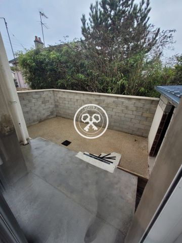 APPARTEMENT AVEC TERRASSE ET GARAGE - Photo 2