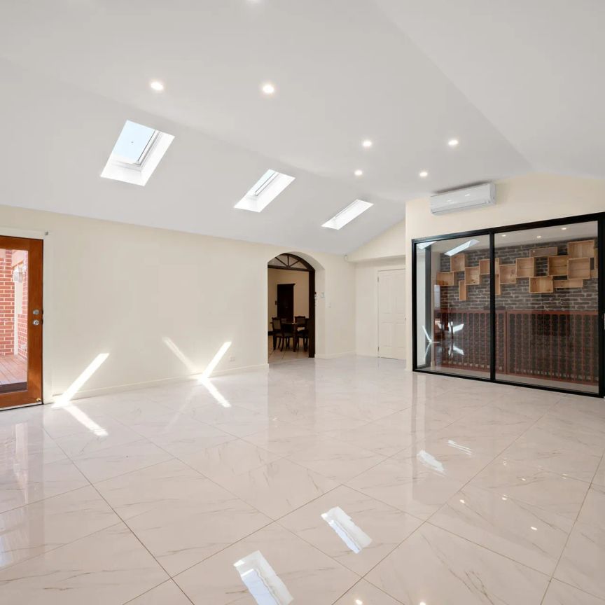 Timeless Tudor Elegance with Modern Luxury - Photo 1